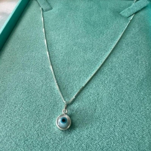 Pingente Olho Grego Madre Pérola P - Prata 925