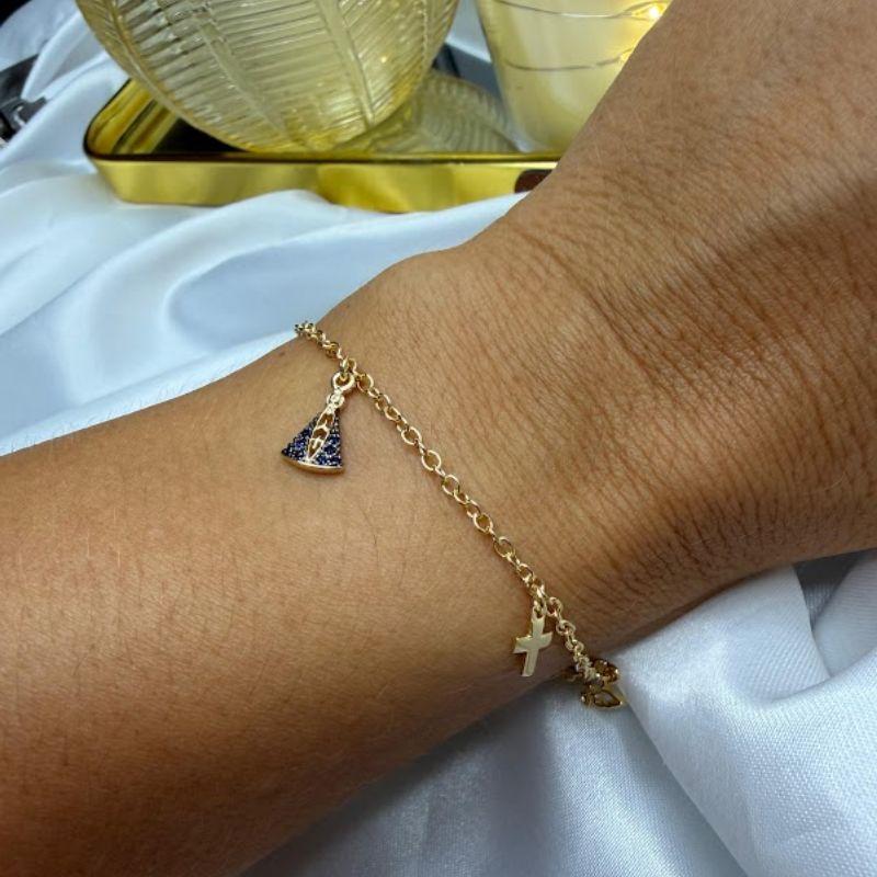 Pulseira com Pingentes de N. Senhora Aparecida, Cruz e Espírito Santo - Banhado a Ouro 18k
