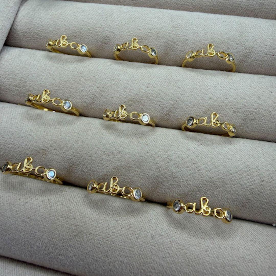 Anel Infantil Formatura do ABC com Ponto de Luz Laterais (Und) - Banhado a Ouro 18k